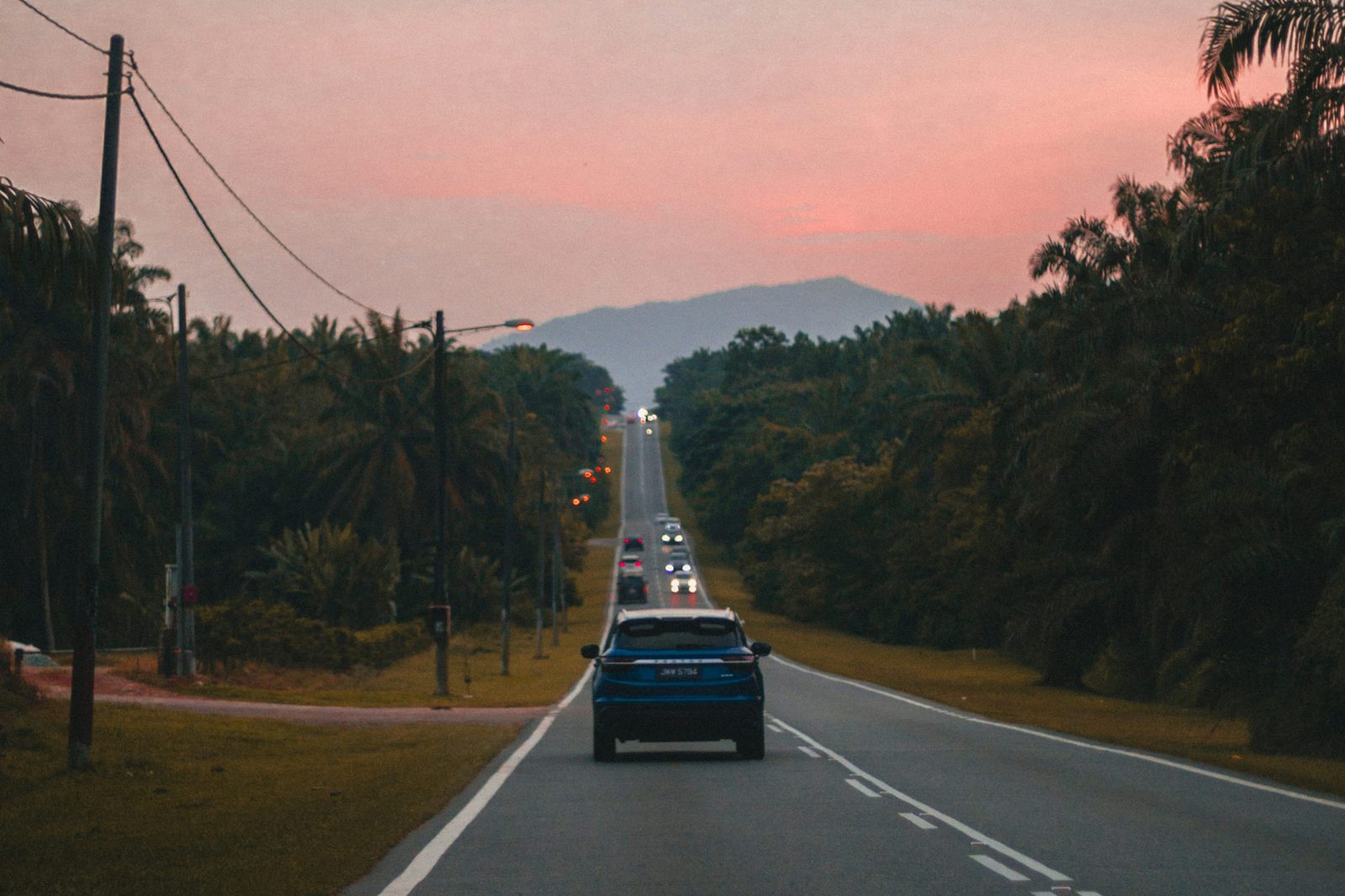 Car driving on an open road