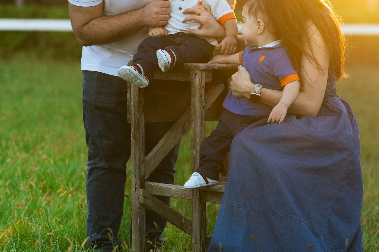Family outdoors at sunset